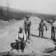 Men in British Columbia, CA working on a highway and living in a labor camp. They were not paid.