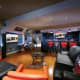 Man cave with full bar and comfortable furniture
Photo credit - http://www.electronichouse.com/article/10_manliest_man_caves/