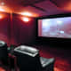 Perfect theater man cave
Photo credit - http://brandonblattner.com/2009/07/24/taxpayer-funded-man-cave-found-at-ny-capitol/