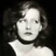 Greta Garbo, 1927, wearing curly medium length bob hair style