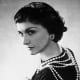 Coco Chanel wearing curly medium length bob hair style