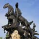 A 'Chariot of the Gods' drawn by horses riding through the sky - an impressive statue