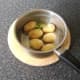 Butter and mint is added to potatoes