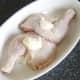 More goose fat and salt is added to whole chicken legs