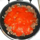 Add tomato sauce and Italian seasonings, then simmer over low heat for 20 minutes