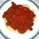 Pour meat mixture over pasta, then serve!