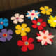 I love to make flowers out of felt and buttons.