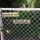 Attach signs to chain link fences.
