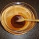 Olive oil and spices are stirred to form a smooth paste