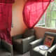 A comfortable sofa set along with the gifted picture of Baba which was requested by the grateful family. 