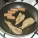 Turkey meat is briefly fried and reheated with sausages