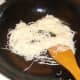 Stir frying rice noodles