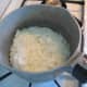 Place wax (a cup or two of flakes) into the saucepan or metal pitcher. If using a pitcher, set the pitcher in a saucepan containing water.