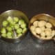 Brussels sprouts and peeled potatoes ready for final cooking touches