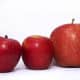 Three different variations of red apples