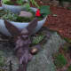 I placed the two-tier garden on an old, mossy stump, then added my fairy figure. She was too big to go directly in the garden.
