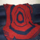 Tried a round afghan pattern. Then added corners to make it longer and wider.