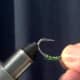 Flip the hook over and set in the tying vice as shown
