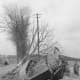 A German Jagdpanther-tank destroyed by air attack near Altenkirchen, Germany. Note another destroyed vehicle across the road.