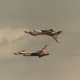 F-16s of the USAF Thunderbirds.  This maneuver predates the movie TOP GUN.