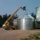 . . . to a sheltered place next to a windbreak and completed grain bins.
