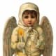 Vintage Christmas angel dressed in ivory coat with candle