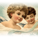 Free vintage Christmas angel clip art: Two angels reading a Christmas scroll