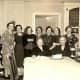 Standing left to right: Alma, my grandmother and others gathered for a birthday party celebration.