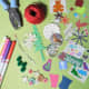 Gather together embellishments, such as, stickers, pens, die cuts and punched Christmas motifs.