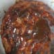 Cover the meatloaf in the ketchup and BBQ sauce and cook for 8 hours on low heat.