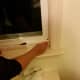 Applying double-sided adhesive tape to the bottom of the window