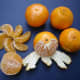 Whole, peeled, half, and clementine sections were photographed by carol on November 7. 2007.