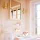 pink bathroom with white fixtures