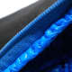 Those dark blue dots are the stitches that attached the lining to the zipper.