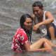 Enjoying bathing at the base of the falls