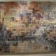 This piece is 8 ft x 5 ft and includes about 40,000 pieces of junk mail.