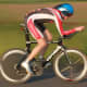 A Cervelo P4 with Zipp Disc and 808 front wheel in a panning photography shot