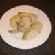 Chicken is cut in to portions for easier deboning