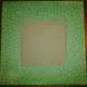 1. Place the corrugated cardboard in the center of the "wrong" side of the cover paper.