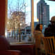 Inside Panera Bread, sipping hot stuff and warming up.