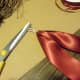 Cut the satin ribbon and fold it in half to make a tail. Use wire or twist tie to hold the center evenly.