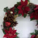 Left side of wreath. This is the only place with bulb ornaments.