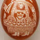 Shepherd motif on scratchwork or etched egg.