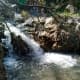 Small Waterfall in the Dense Forest of Khanaspur
