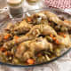 Rabbit alla cacciatora with pine nuts and olives