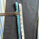 Determine the stretch of your fabric, the size of your neck, and cut your stretch tube the needed length.