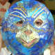 You can do lots of things to cover up the mask so it doesn't look like a paper plate too.