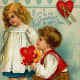 Cute kids: little boy and girl vintage Valentine card