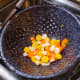 Put the "shocked" carrots in a colander to dry a bit.