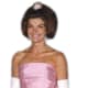 Jackie Kennedy wearing gloves in a pink evening gown